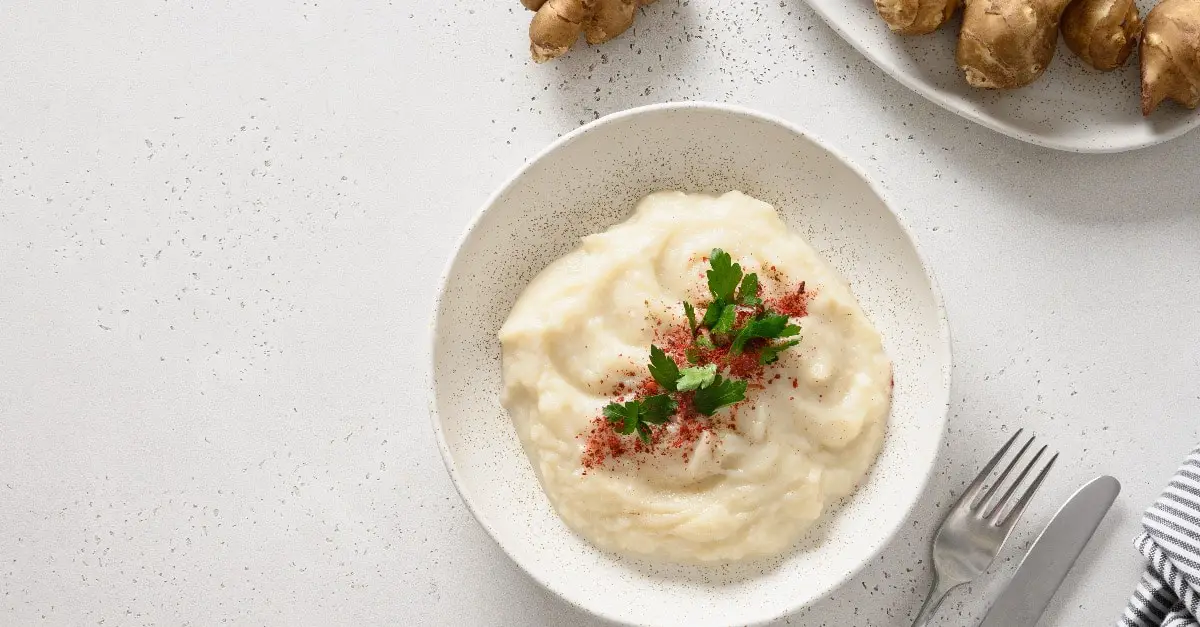 Purée de topinambours à l'ail et aux herbes